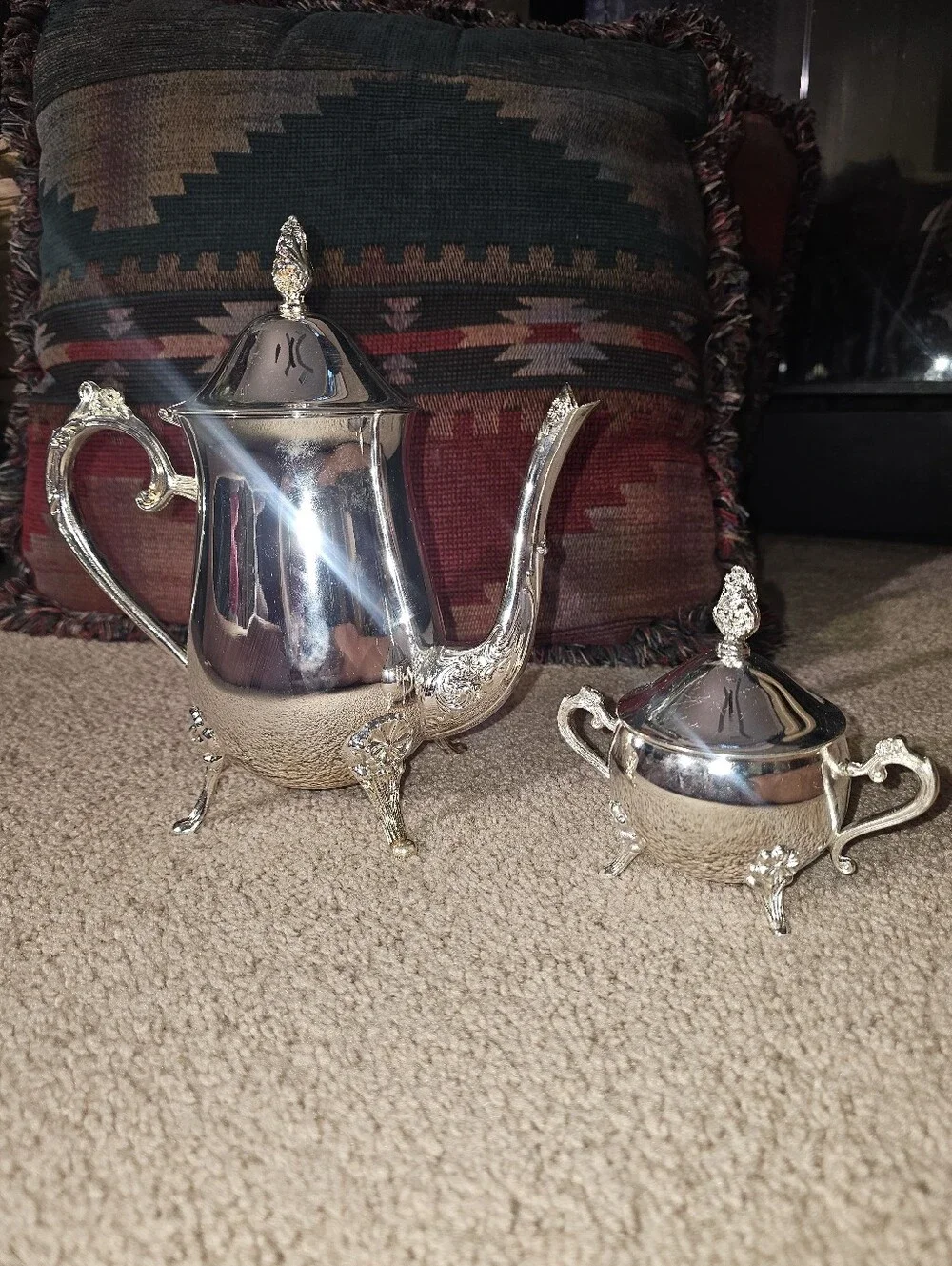 Vintage silverplated coffee/tea pot and covered sugar bowl set.